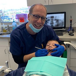 Denver dentist treating dental patient