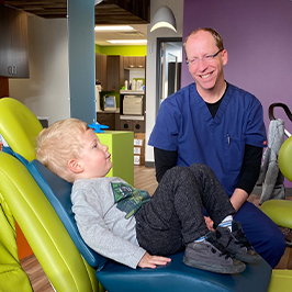 Smiling little boy in dental office