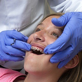 Child with braces during exam