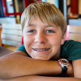 Smiling teen boy with braces