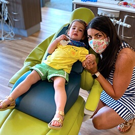 Smiling young boy in dental chair