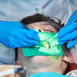 teen patient getting a filling