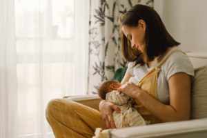 mother breastfeeding her baby